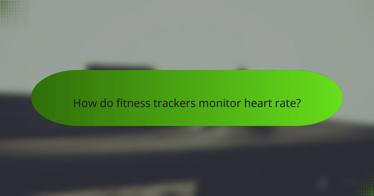 How do fitness trackers monitor heart rate?